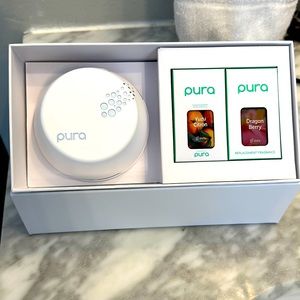 Brand new in box pura diffuser with 2 scents